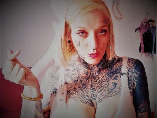 Foto del profilo sexy della modella DroolingTits69, per uno show live webcam molto piccante!